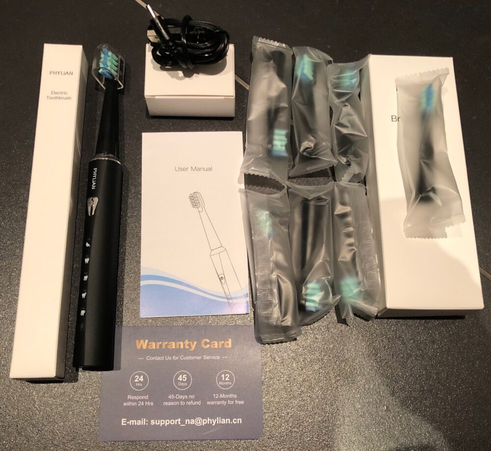 Phylian elektrische Zahnbürste (Verpackungsinhalt) Phylian elektrische Zahnbürste - Verpackungsinhalt